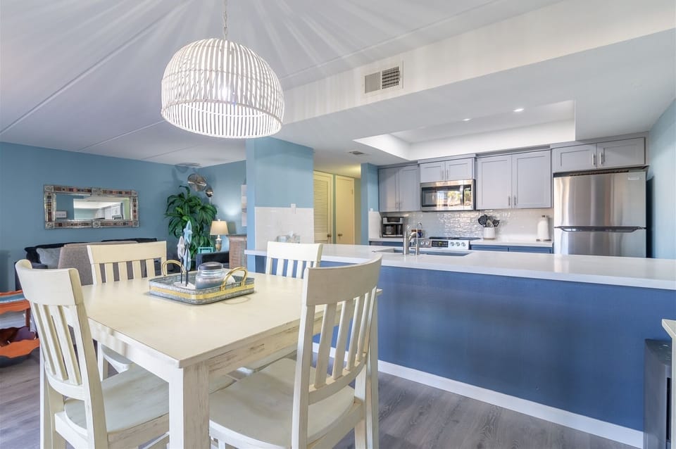 Open floorplan with a wall of windows opening to the spacious patio deck,  Vacation Rental South Padre Island Padre Oasis 209