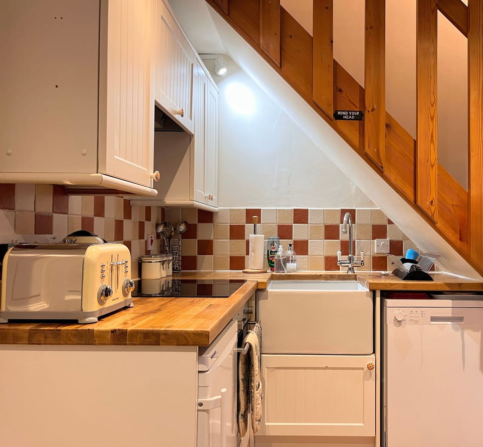 Kitchen with a fan oven, 4 plate ceramic hob, dishwasher, fridge-freeze and more