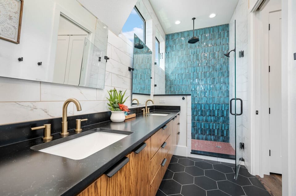 Master bathroom with walk-in shower and double sinks