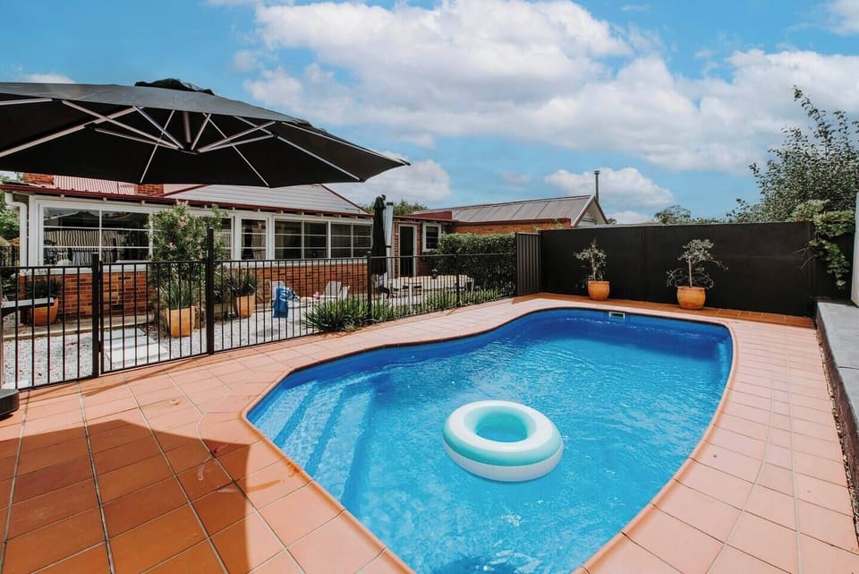 Jump into the pool or spread out a towel to soak up the sun, the home features a sprawling indoor-outdoor living to slow down and unwind. 