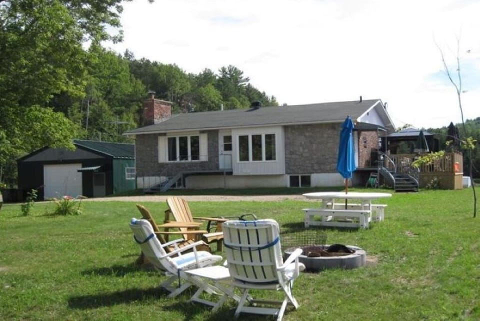 The front of the cottage & deck are Private & Wild Oasis. 