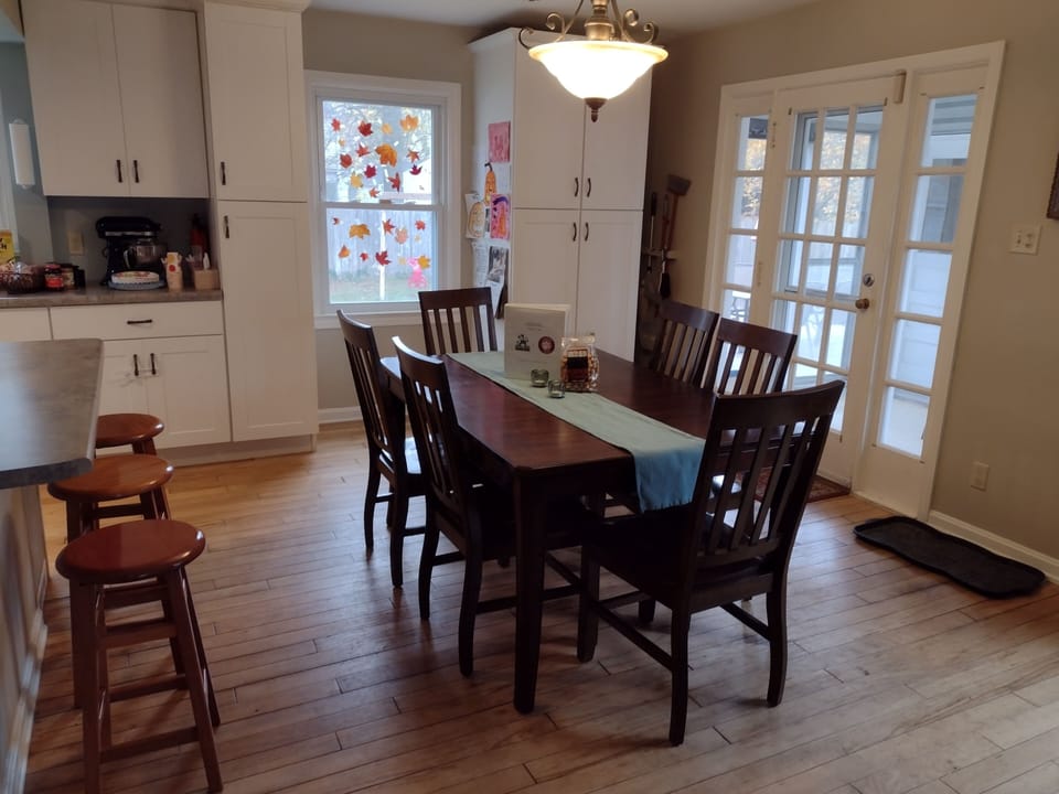 Dining Room. Open to Living Room and Kitchen. More chairs and leaf avail.