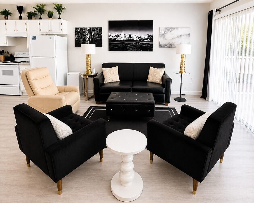  Step into stylish mountain living! This chic 1-bedroom retreat sleeps 4 in absolute comfort, featuring bold black & white décor that'll make your Instagram pop."