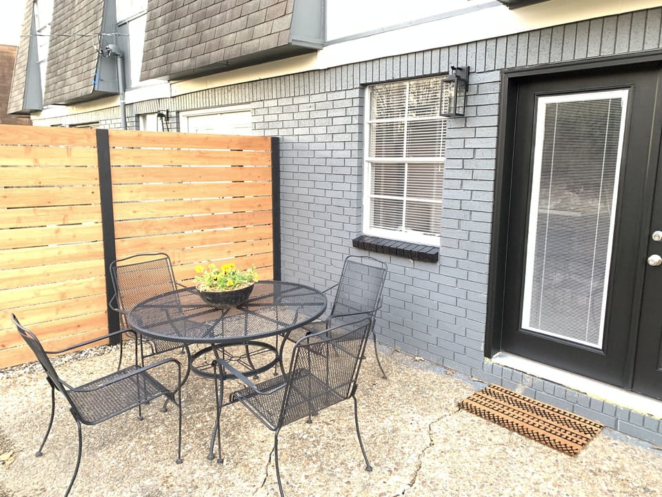 Back patio with seating for four