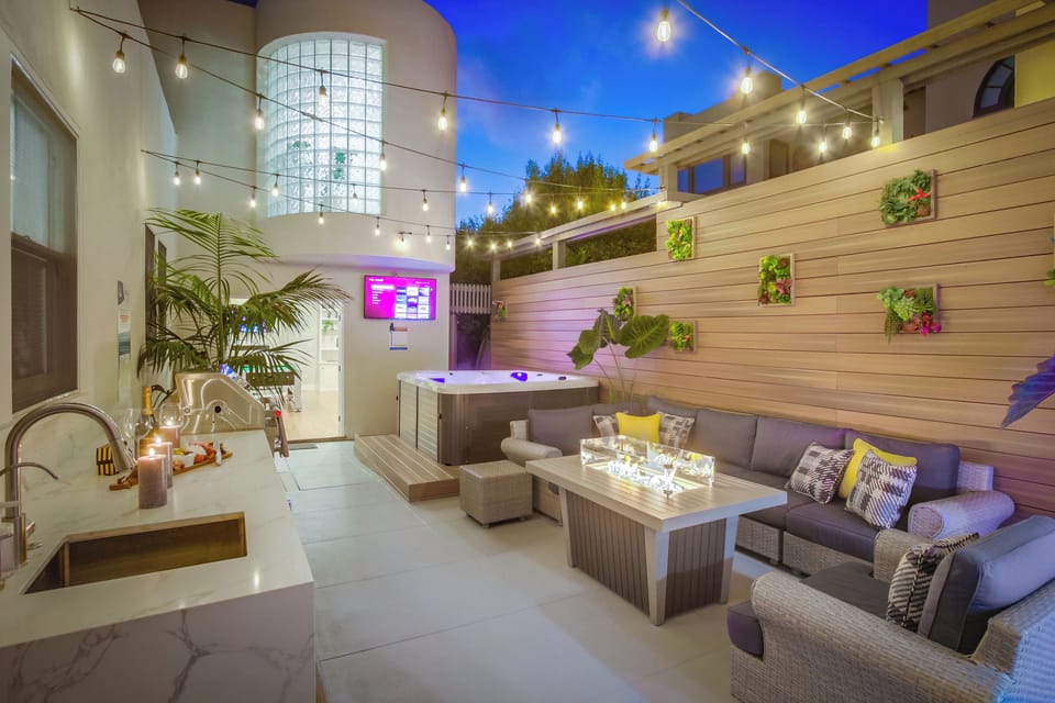Step outside to the private seating and grill area, ideal for relaxed gatherings and open-air living.