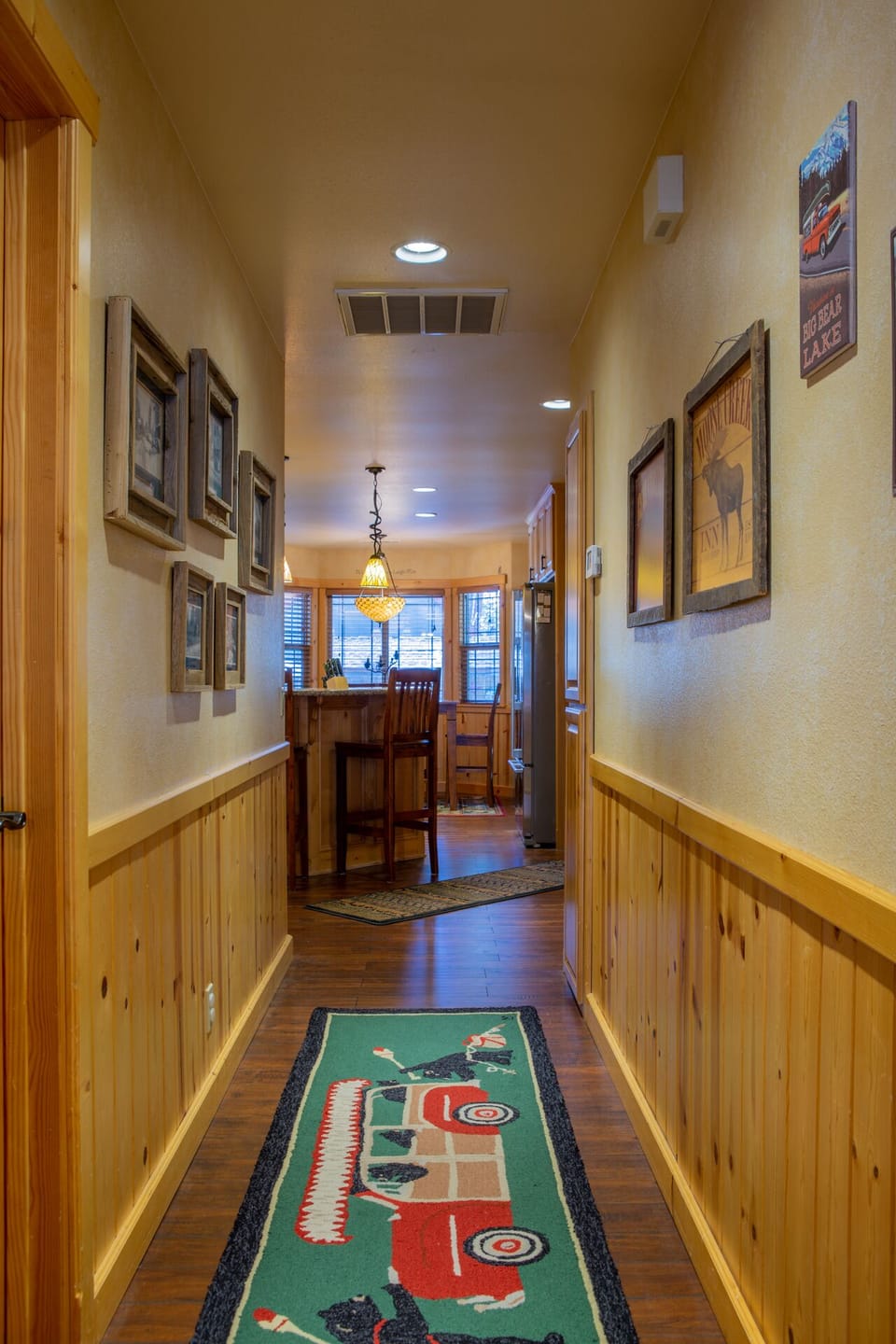 Hallway separating family room from kitchen. Enjoy photos of Big Bear's history!