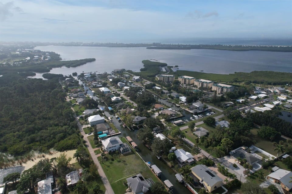Aerial view of house and Lemon Bay