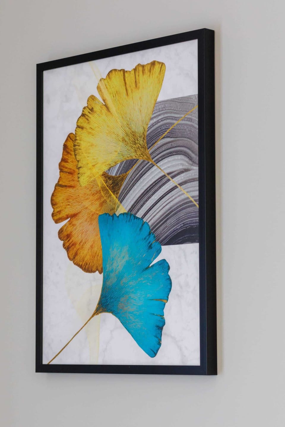 A close-up of an abstract painting in vibrant colors, adding character to the space.
