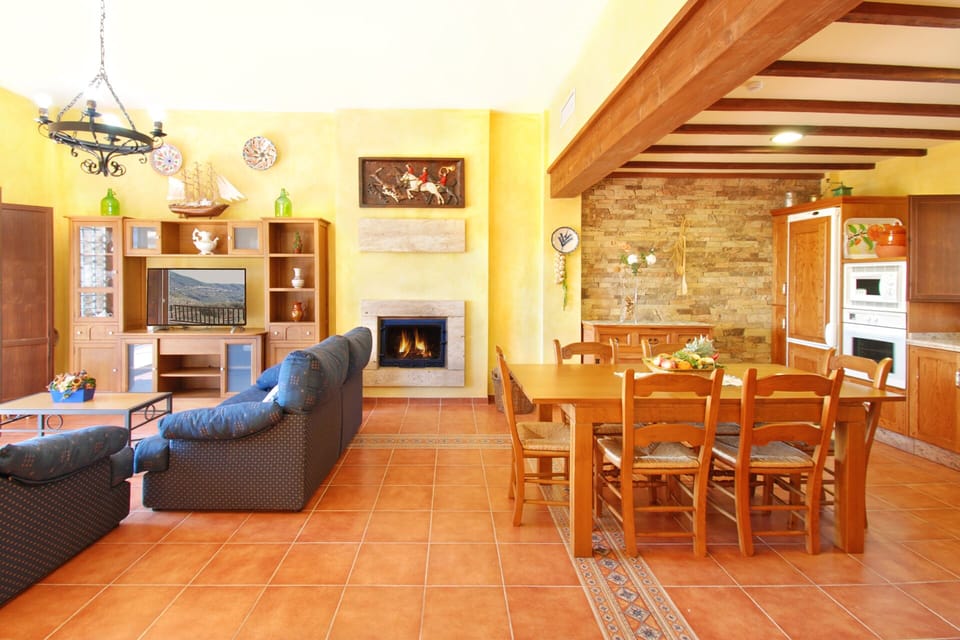 The living room with lounge and large open-plan kitchen with dining area.
