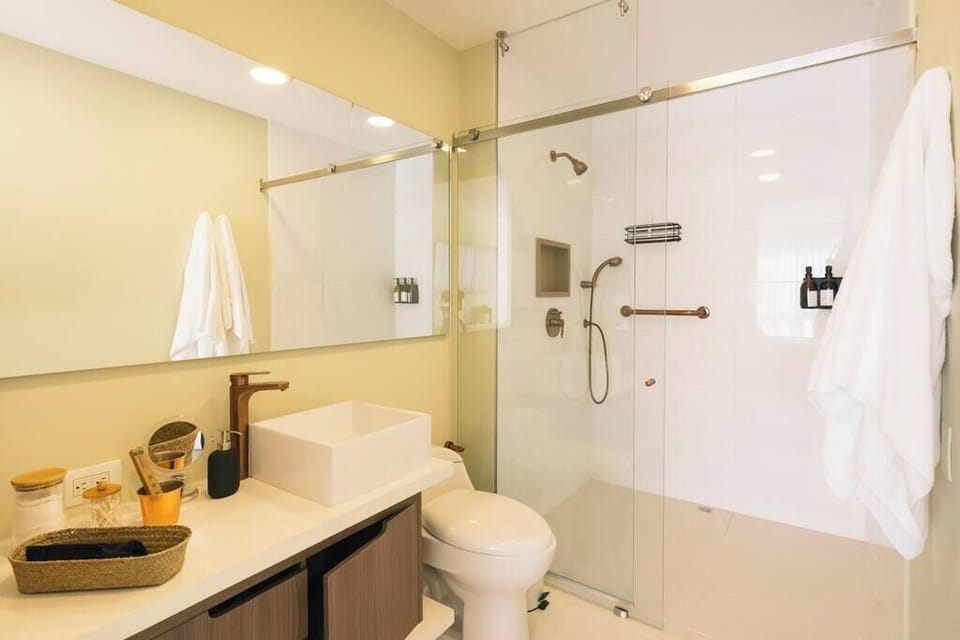 Wide open master bathroom, thick towels and every amenity you may need for a trip.