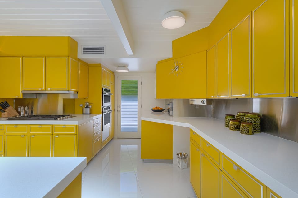 Sunny kitchen with abundant cabinet space. 