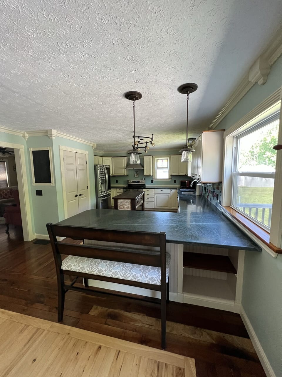 Kitchen's breakfast bar and seating. 