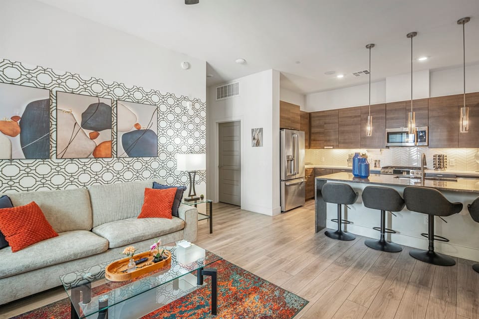 Bright, open-concept living room with cozy seating for everyone