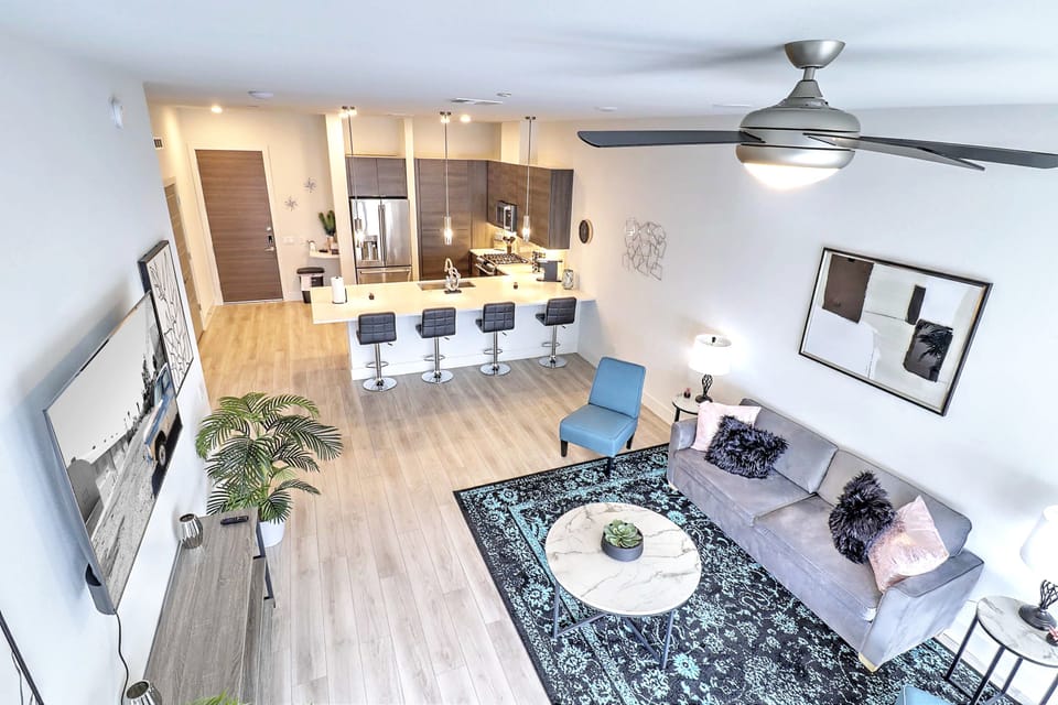 Sink into luxury with our new sofa and kitchen
