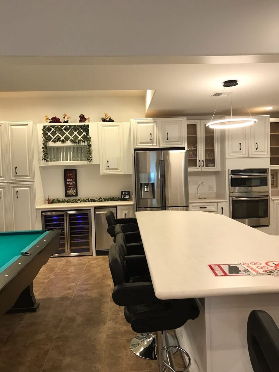 down stairs kitchen with wine chiller