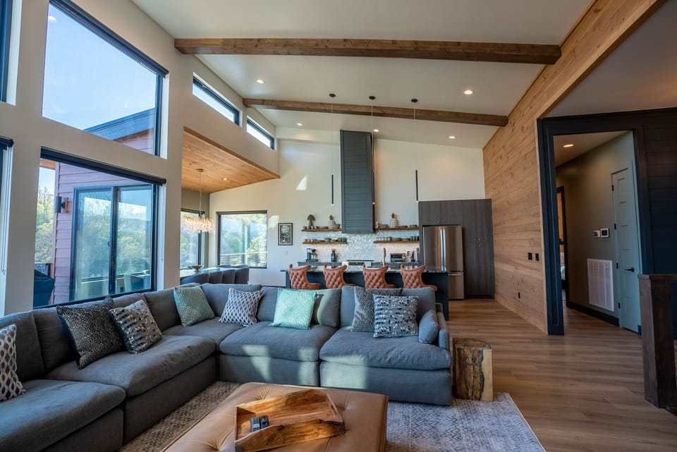 Open-concept floor plan with luxury finishes and soaring ceilings