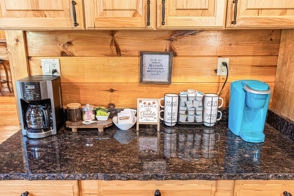 We have a wonderful coffee bar that includes a drip coffee maker, a Keurig style coffee maker and starter K-cups, a french press, a coffee grinder and plenty of cups.