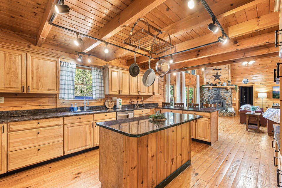 Fully equipped kitchen with modern amenities, ready for home-cooked meals and unforgettable feast.