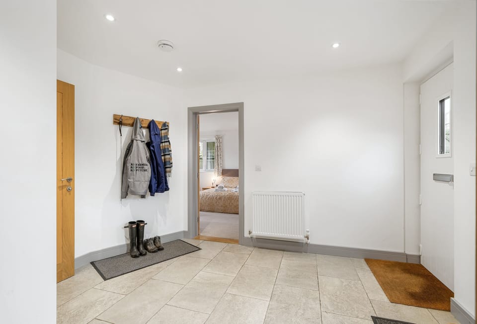 Hayloft at Trevissick Farm, Porthtowan. The entrance hall boasts plenty of space, WC and the downstairs bedroom