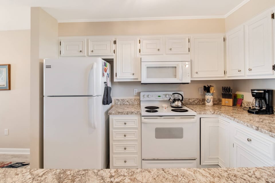 The fully stocked kitchen makes it simple to prepare delicious meals.