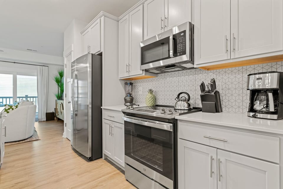 Kitchen Area with Bar Seating on Second Level