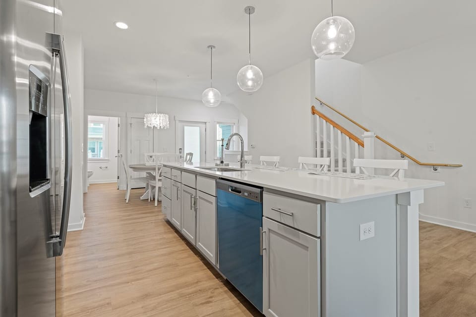 Kitchen Area with Bar Seating on Second Level