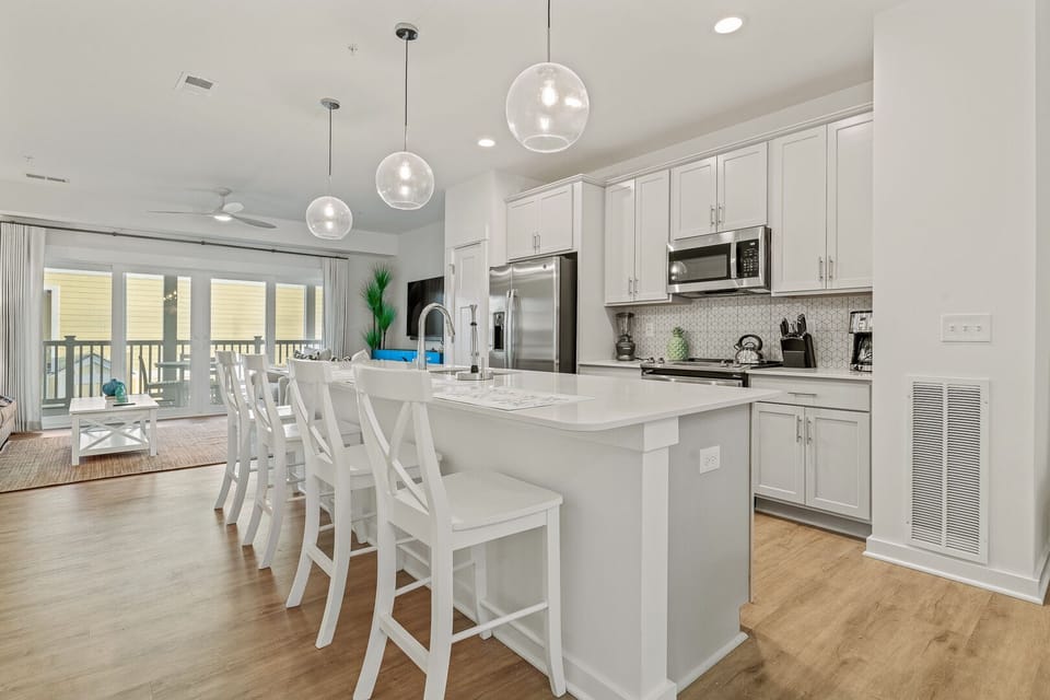Kitchen Area with Bar Seating on Second Level