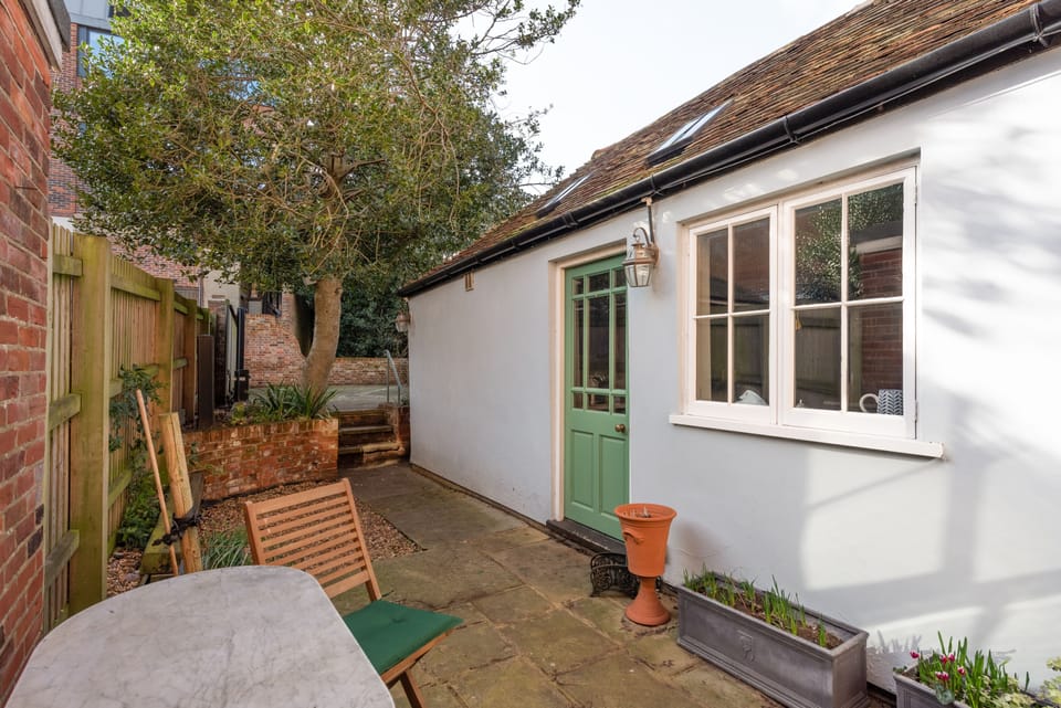 The quiet, sunny, city courtyard garden.  Secure gated private parking beyond