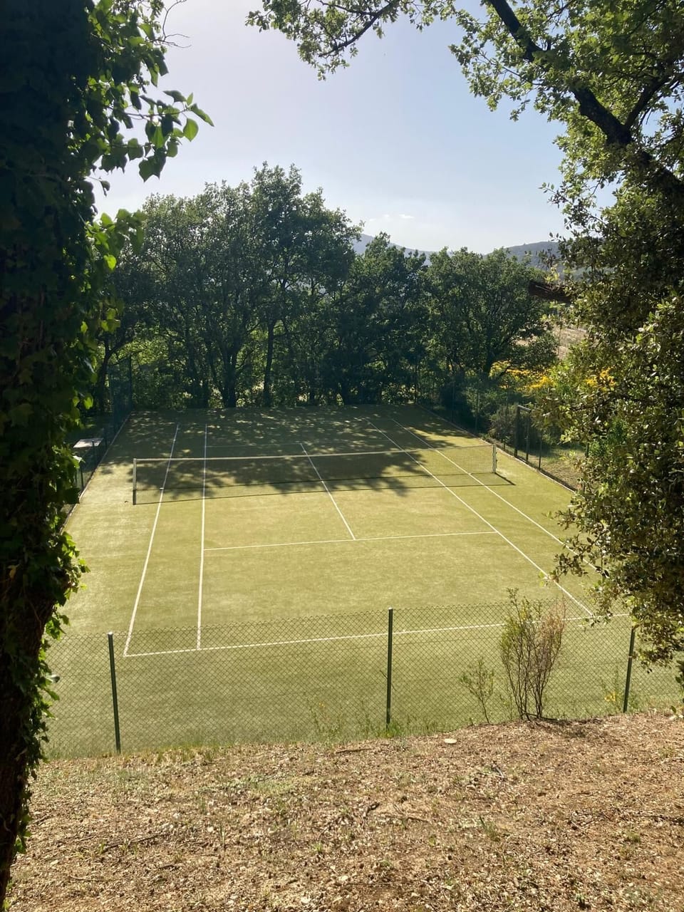 Artificial grass tennis court. Equipment provided 