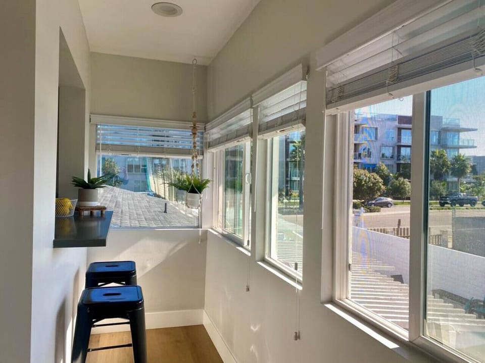 View of 2nd bar seating area. Lots of windows to let the fresh ocean breeze and to view the most amazing sunsets!