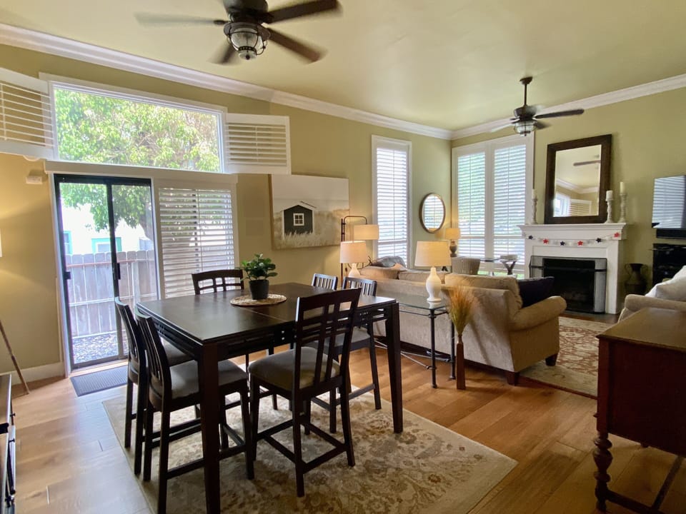 Large living/dining area with access to yard