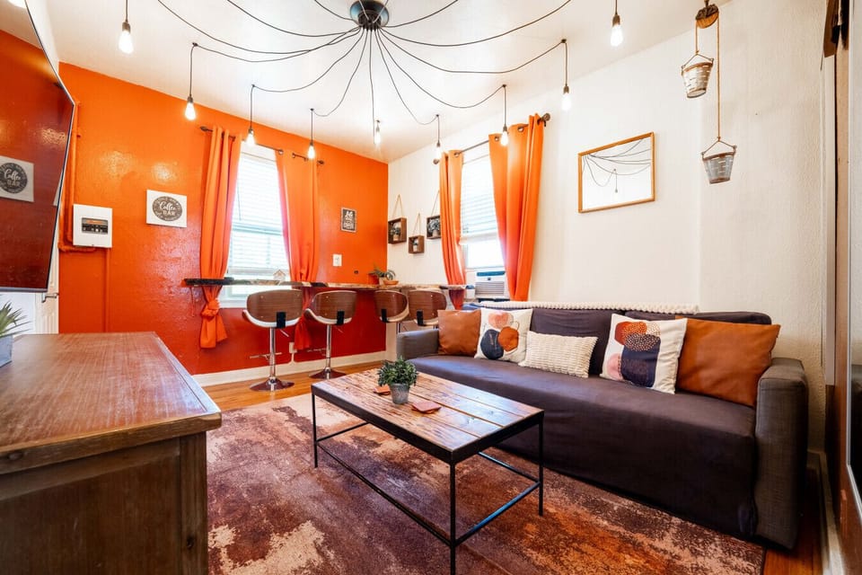 Vibrant decor and playful lighting create a lively space for relaxation and fun!