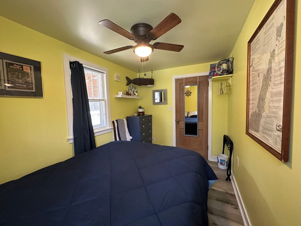 Room 2 has hangers and a luggage rack.