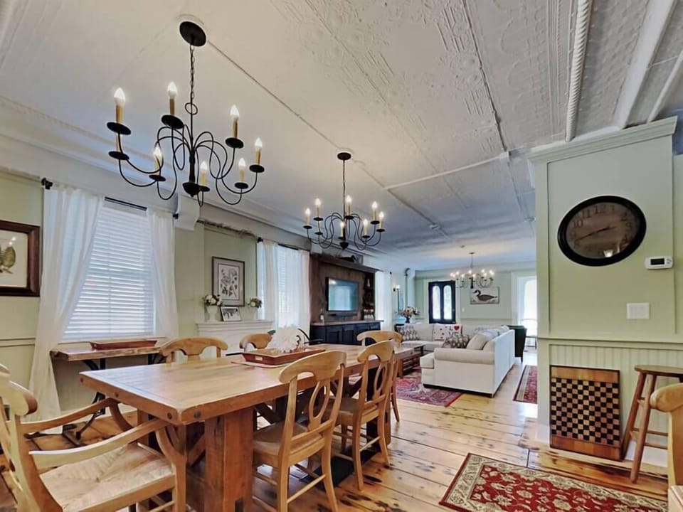 Table is made from reclaimed barn wood and great for a large dinner.