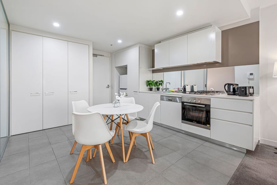 Discover the joy of cooking in our sleek, modern kitchen. Culinary adventures start in style