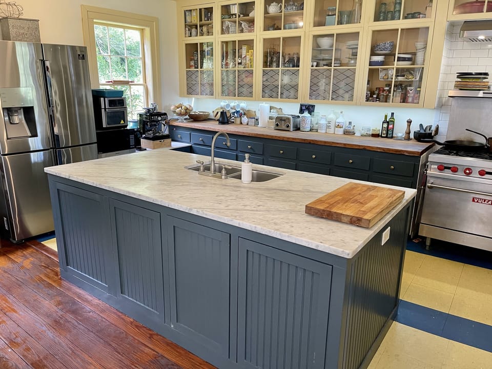 Eat-in kitchen with a lovely sunroom just off the kitchen and patio.