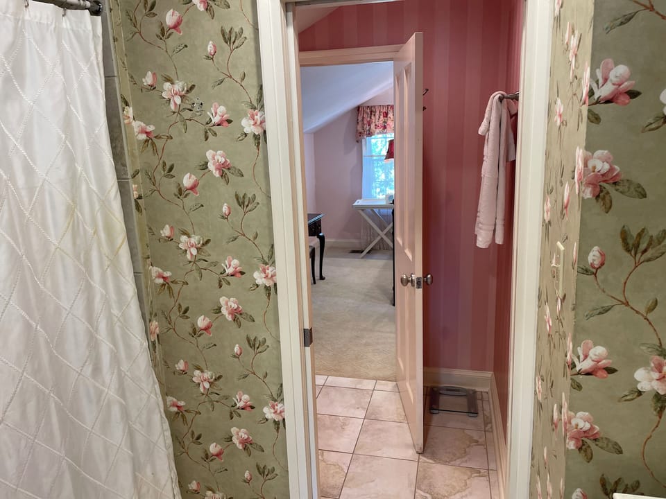 Upstairs bedroom are connected via pocket doors for privacy.