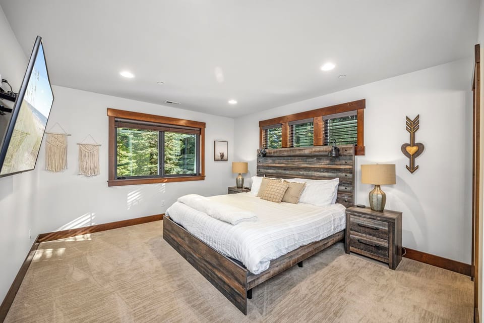 Upper floor - Bedroom 2, King Sized Bed + En Suite Bathroom With Shiplap Accent Wall And Warm Mountain Textures