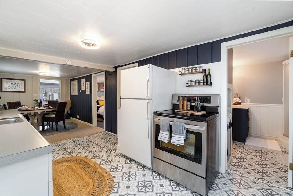 Prepare meals in a fully equipped kitchen with plenty of plate ware, pots/pans, complimentary coffee bar (tea, decaf, regular, flavorings), spice racks, microwave, toaster, kettle, and brita water pitch (cottage has well water).