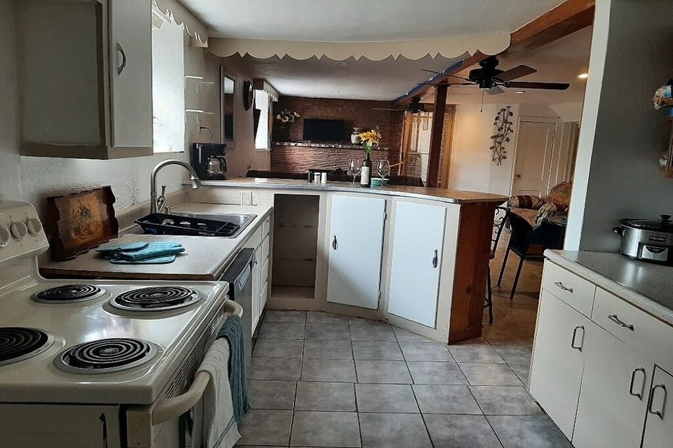 Full Kitchen: Range, Oven, Microwave
Full size Refrigerator, New Dishwasher