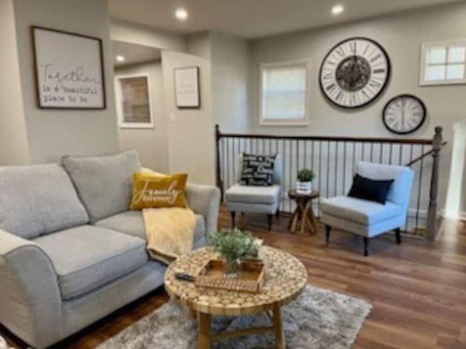 Upstairs sitting area containing a 55 inch T.V.