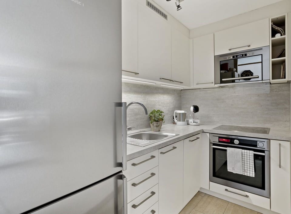 Cabinetry, Countertop, Building, Kitchen Stove, Kitchen Appliance, Home Appliance, Kitchen, Drawer, Flooring, Interior Design