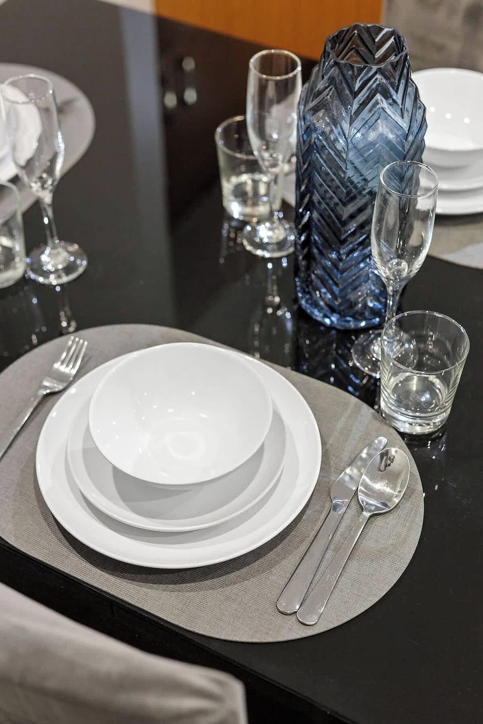 Dine in style with our provided selection of plates and glassware. Everything you need for enjoying your meals is readily available for your convenience.