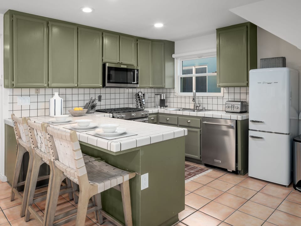 Enjoy high-end designer appliances, cookware, and utensils for a seamless and comfortable stay.