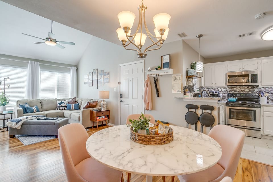 Full dining room open to kitchen and living space.
