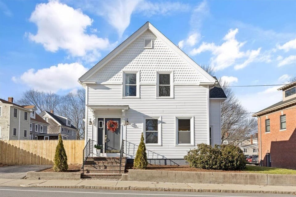 Front of the polished historic, modern antique home where you'll be staying!