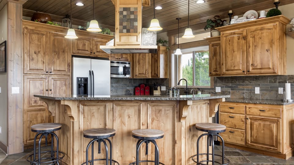 Full kitchen; Island sits 4 located on main floor