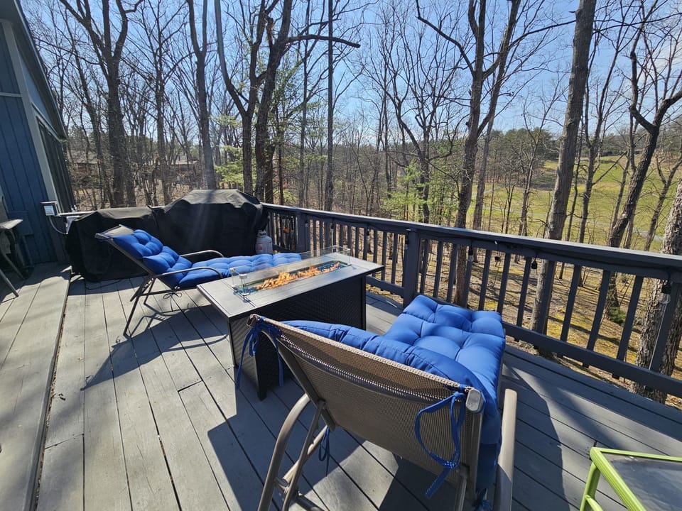 A propane gas fire pit located on back  deck!
