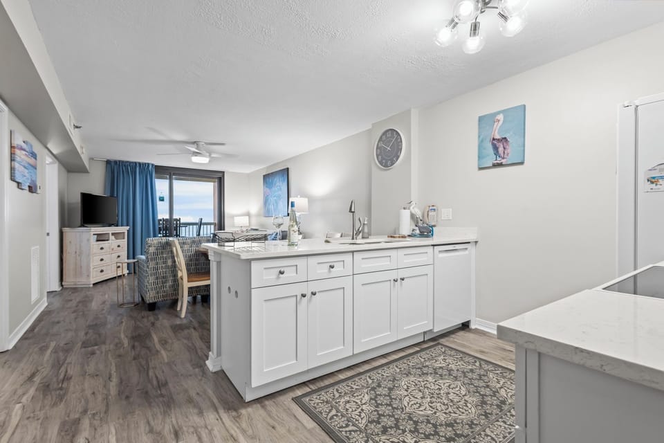 Fully equipped kitchen with modern appliances—perfect for home-cooked meals.