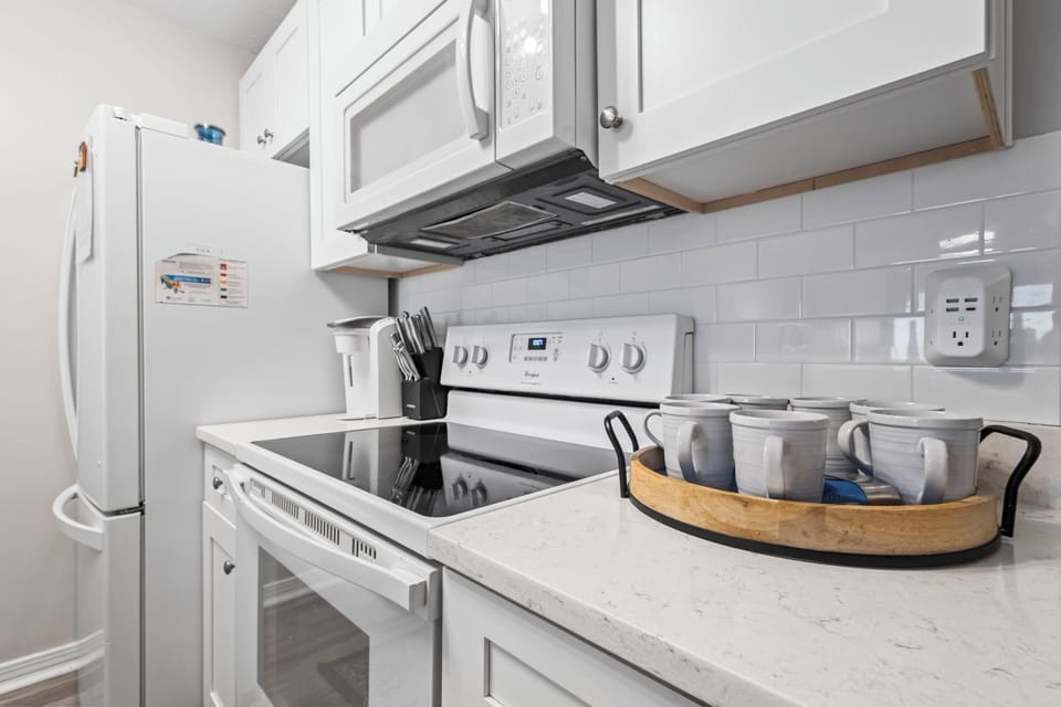 Fully equipped kitchen with modern appliances—perfect for home-cooked meals.